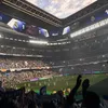 A football stadium with a scoreboard showing the score. Produktbild-Vorschau