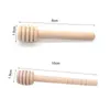 Two wooden honey dippers are shown with dimensions indicated. Podgląd zdjęcia produktu