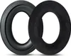Two black headphone ear pads are shown on a white background. One is a ring with a leather-like outer surface and a foam inner cushion. The other is a plush fabric ring. Produktbild-Vorschau