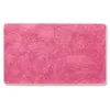 A pink bath mat on a white background. Náhled obrázku produktu