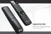 A black remote control and its case are displayed on a white and gray background with text describing its features. Produktbild-Vorschau