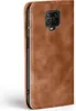A brown leather flip case for a smartphone, shown from the side. Produktbild-Vorschau