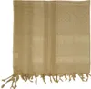 A tan-colored scarf with a woven pattern and fringe detail, laid flat against a white background. Produktbild-Vorschau