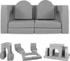 A modular play sofa set for children, shown in two configurations: a full sofa and disassembled building blocks. Voir les images du produit