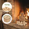 Wood briquettes are displayed next to a fireplace, with a bag of briquettes and a mug on the hearth. Voir les images du produit