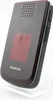 A red Nokia flip phone is displayed on a white stand against a white background. Produktbild-Vorschau