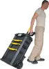 A person is pulling a rolling toolbox. Náhľad obrázku produktu