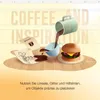 An illustration showing coffee being poured into a cup, with a burger and some papers on a wooden surface. Text overlays suggest design or creative processes. Produktbild-Vorschau