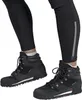 A close-up shot of a person's legs wearing black leggings and black hiking boots. Voir les images du produit
