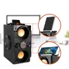 A black Bluetooth speaker with two subwoofers and a phone stand, shown with close-up insets of phones placed on the stand. Podgląd zdjęcia produktu