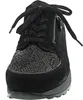 A close-up, front-facing view of a black women's sneaker. Náhled obrázku produktu