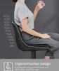 A person sitting on a bar stool, holding a glass of water. The image highlights the ergonomic design of the stool. Produktbild-Vorschau