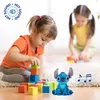 Two young girls are playing with building blocks and a stuffed Stitch toy on the floor. Náhľad obrázku produktu