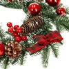 A close-up view of a Christmas wreath decoration. Náhled obrázku produktu