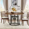 A round dining table with chairs in a dining room setting. Náhľad obrázku produktu