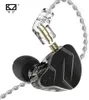 A close-up studio shot of a pair of in-ear monitor headphones, showing the detachable cable mechanism. Podgląd zdjęcia produktu