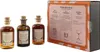 Three small bottles of liquor and a box with cocktail recipes. Produktbild-Vorschau