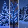 A collage of three images showing blue LED icicle lights on trees and a Christmas tree in snowy environments. Produktbild-Vorschau