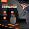 A mechanic is using a digital refrigerant scale with a gas cylinder on it, next to a car. Voir les images du produit
