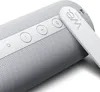 Close-up of a white Bluetooth speaker with control buttons. Produktbild-Vorschau