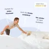 A man is making a bed, with text overlays highlighting product features. Produktbild-Vorschau