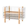 A baby crib on a white background. Produktbild-Vorschau