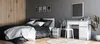 A bedroom scene featuring a bed, a vanity table with a mirror, and decorative elements. Produktbild-Vorschau