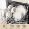 A dishwasher rack filled with white ceramic plates and bowls. Náhled obrázku produktu
