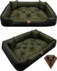 Two views of a dog bed, one from a slightly elevated angle and another from a straight-on perspective. A diamond-shaped logo with a dog's face is visible on the front of the bed in both views, and also separately in the bottom right corner. Náhľad obrázku produktu