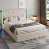 A bedroom scene featuring a bed with LED lighting. Produktbild-Vorschau