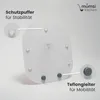 The underside of a white kitchen accessory, likely a cutting board or a base for a kitchen appliance, is shown with labels pointing out its features. Produktbild-Vorschau
