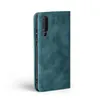 A teal flip cover phone case is shown against a white background. Produktbild-Vorschau