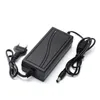 A black power adapter with two cables, one with a European plug and the other with a barrel connector, is shown on a white background. Produktbild-Vorschau
