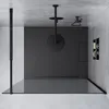 A modern black walk-in shower enclosure with a glass front, set against a concrete wall and floor. Produktbild-Vorschau