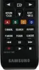 A black Samsung TV remote control is shown against a black background. Produktbild-Vorschau