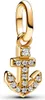 A close-up studio shot of a gold anchor charm with clear stones, set against a white background. Podgląd zdjęcia produktu