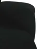 A close-up view of a black velvet armchair. Náhľad obrázku produktu