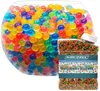 A clear shot of colorful gel balls in a glass bowl and a container of gel balls. Náhled obrázku produktu