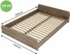 A wooden bed frame with a slatted base, shown from a diagonal angle. Náhľad obrázku produktu