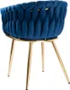 A close-up view of the back of a blue velvet chair with gold legs. Náhled obrázku produktu
