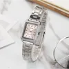 A close-up shot of a silver Casio watch with a pink face, placed on a marble-like surface. Produktbild-Vorschau