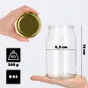 A hand holds a glass jar and its lid, with measurement indicators and weight information displayed next to it. Anteprima dell’immagine prodotto