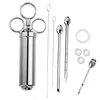 A set of stainless steel meat injectors and cleaning brushes are laid out on a white background. Voir les images du produit