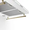A close-up, studio shot of a white kitchen range hood with gold accents. Náhľad obrázku produktu