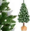 A Christmas tree with artificial snow and a natural trunk, wrapped in burlap at the base. Produktbild-Vorschau