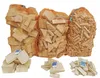Three bags of firewood are displayed on a white background, with smaller piles of firewood and matchboxes in the foreground. Produktbild-Vorschau