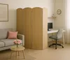 A living room with a sofa, a desk, and a room divider. Podgląd zdjęcia produktu