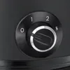 A close-up of a black dial with silver accents and markings for settings 0, 1, and 2. Anteprima dell’immagine prodotto