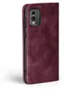 A burgundy flip-style phone case for a Nokia C32 is shown against a white background. Produktbild-Vorschau