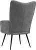 The back view of a dark gray velvet armchair with black legs. Voir les images du produit